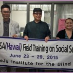 Photo of President Yang Ye Hong and Mr. Kim Chan Soo from the Jeju Institute For the Blind with AILH Executive Director, Roxanne Bolden