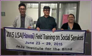 Photo of President Yang Ye Hong and Mr. Kim Chan Soo from the Jeju Institute For the Blind with AILH Executive Director, Roxanne Bolden
