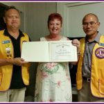 Photo of Sam with Lions Club Presidents