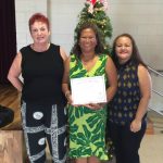 Photo of Sam, Lani, and Roxanne with Lani's 3-year anniversary certificate of appreciation