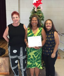 Photo of Sam, Lani, and Roxanne with Lani's 3-year anniversary certificate of appreciation