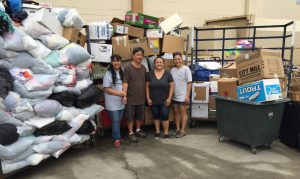 Photo of AILH Oahu staff with Savers' donation load