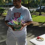 Photo of Mario Fernandez holding Easter basket