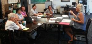 Photo of participants seated around table for Maui Hawaii Fi-Do training