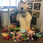 Photo of giant stuffed bear and other stuffed animals