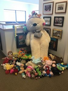 Photo of giant stuffed bear and other stuffed animals