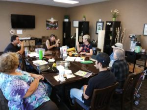 Photo of Maui Support Group meeting around conference table