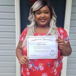 Photo of Leelynn Brady holding certificate